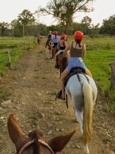 Horseback riding to Hermosa Beach, South Pacific, Costa Rica photo